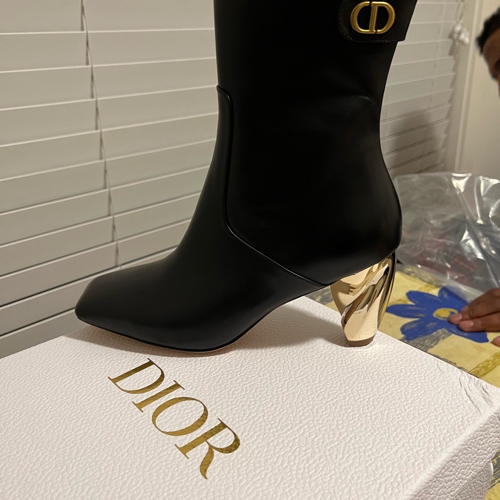 Christian Dior black boot with gold heel only worn once. Great condition